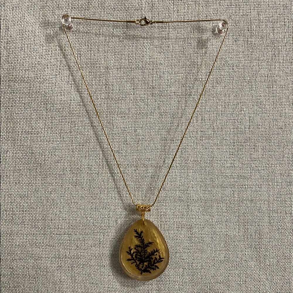 Gold Pendant Necklace with Black Detailing